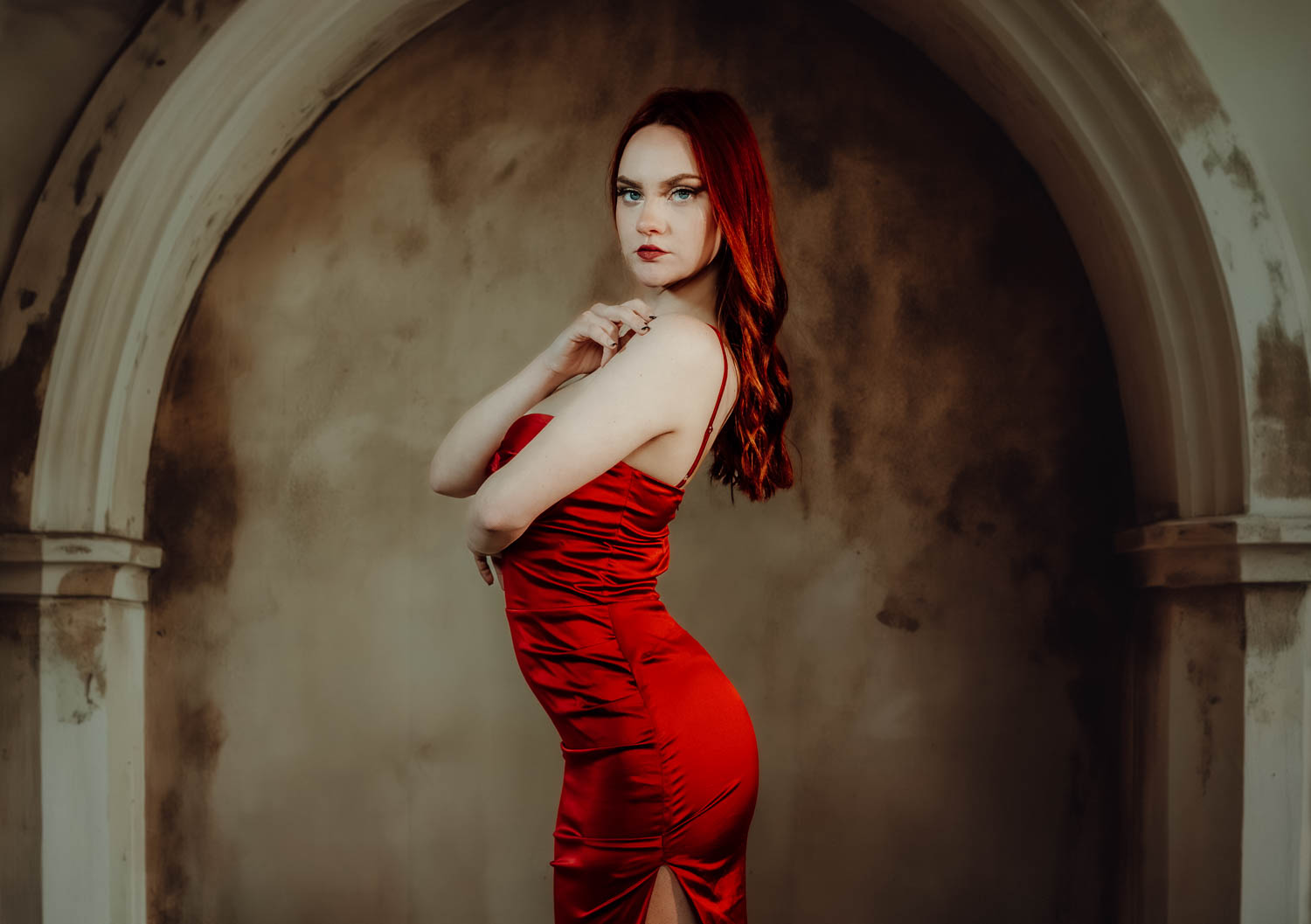 Lansing senior glam red dress in studio with off camera flash.